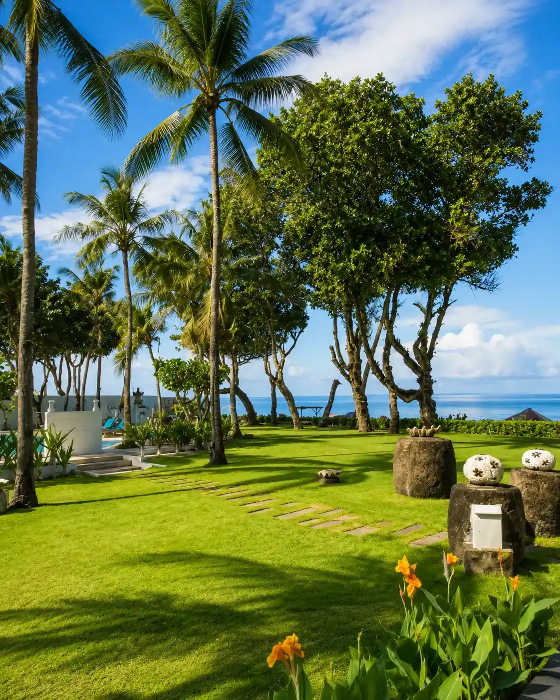 Lush tropical gardens at Legong Keraton Beach Hotel