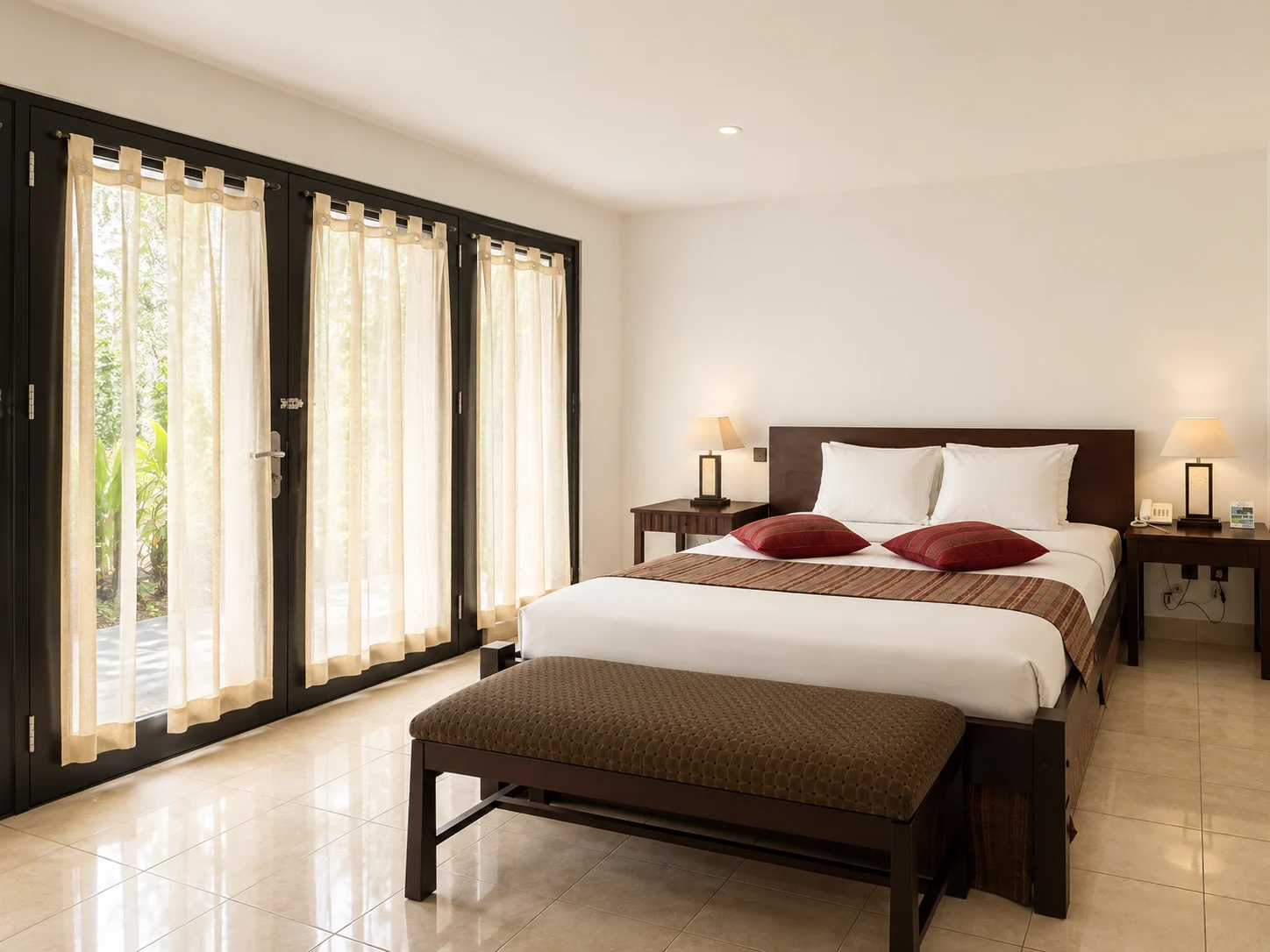 Beachfront Deluxe room overlooking Berawa Beach at Legong Keraton Beach Hotel, Bali